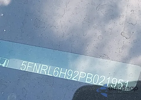 2023 Honda Odyssey Elite z USA, uszkodzony, nr VIN 5FNRL6H92PB021951